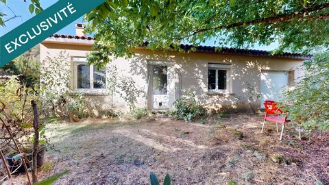 Maison de plain-pied avec garage et terrain clos