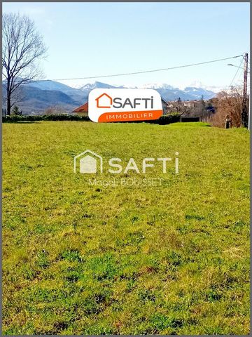 Terrain à bâtir de 1703m2 dans un quartier résidentiel calme, vue dégagée sur la chaine des Pyrénées.