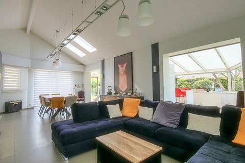 MAISON D'ARCHITECTE SEMI- PLAIN-PIED AVEC JARDIN ET GARAGE A LEFFRINCKOUCKE