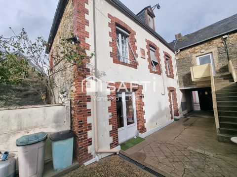 Immeuble avec commerce et logements – plein centre du Molay-Littry