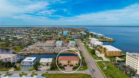 Under contract-accepting backup offers. Welcome to Siesta Cove, where the allure of waterfront living meets a touch of elegance in this 3-bedroom, 2-bathroom condo. With 1,900 sq ft of inviting living space on the second floor, this turnkey furnished...