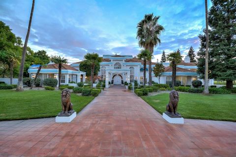 ***A HEAVENLY ABODE***Indulge in a serene lifestyle across nearly 50 acres of pure tranquility. With six well-stocked fishing ponds dotting the landscape and exquisite interior design details, this private estate is a true marvel. European influences...