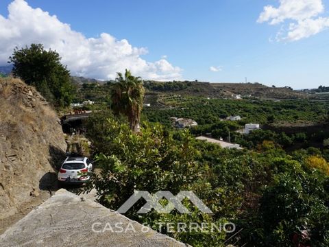 15 minutes from the coast of Nerja, and 10 from the motorway, is this fabulous agricultural plot with all kinds of fruit trees and a structure to reform into a country house of 69 m2. You can build two bedrooms, one bathroom, a living room and a kitc...
