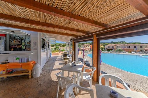This fantastic apartment in Sardinia enjoys a magical location, close to the sea and numerous services. With a shared swimming pool and a beautiful private terrace, it is ideal for sun holidays with family or friends.The residence is located 250 mete...