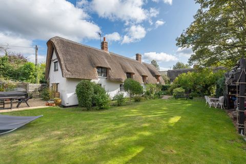 This enchanting historic cottage is nestled in a thriving village within easy reach of Cambridge and is a treasure trove of period features that exude timeless charm. Upon crossing the threshold through the inviting porch, you'll be greeted by the ch...