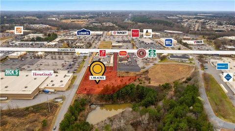 Welcome to an exceptional opportunity in Anderson, SC! This prime 2.6-acre parcel boasts an ideal location within a bustling shopping center, surrounded by major retail giants like Home Depot, TJ Maxx, Academy, and Office Depot. Strategically positio...