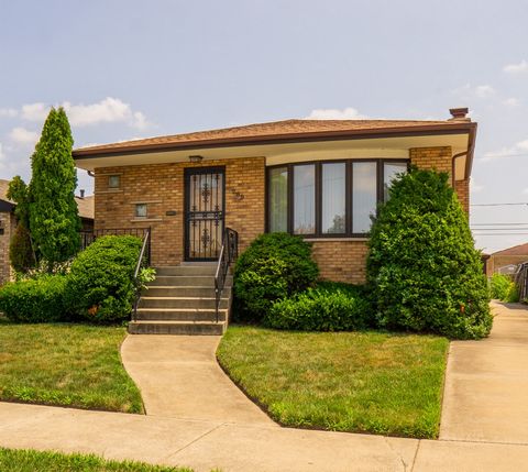 Welcome to Calumet City! Step into this Beautiful Brick Bungalow, Nestled on a quiet Block. This Home Features 3 Bedrooms, 2 Full Baths, a 2.5 Car Garage and a Newly updated Full Finished Basement. New floors thought the living room, kitchen and base...