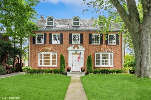 Where stately and elegant traditional design meets modern luxury. This masterfully renovated classic East Kenilworth solid red brick home has been totally reimagined with the very best high end luxury finishes chosen. Beautiful vestibule leads to lar...