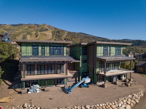 Located in the Green Zone and a short walk from the Steamboat Ski Resort, this luxury five bedroom home with an elevated location has a well-considered floor plan and chic finishes that combine to create a mountain modern masterpiece. Dramatic views ...