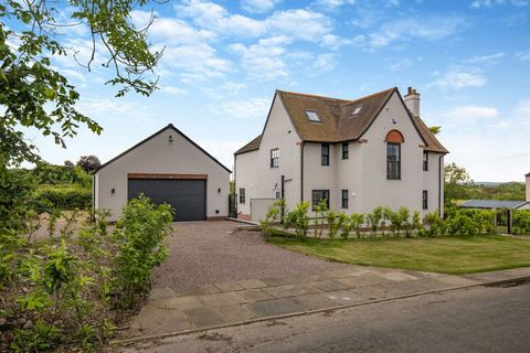 An exceptional home set within ¼ of an acre grounds, backing onto glorious open countryside resulting in far reaching views and the most idyllic of rural settings. Offering spacious six bedroom accommodation, incorporating an open plan living kitchen...