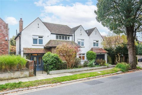 Positioned on a wide, tree lined road leading directly to the expansive green spaces of Hove Park, this exceptional property offers a rare opportunity to acquire a luxurious family home. Boasting a large south facing garden and two generously sized S...