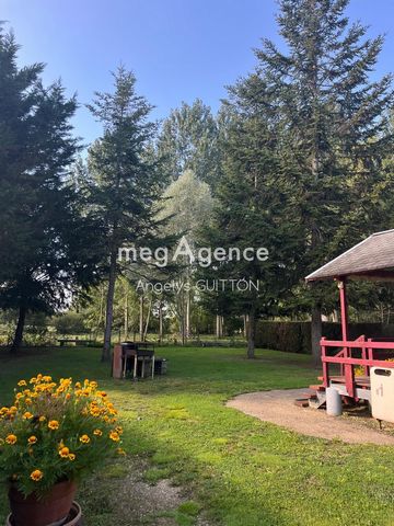 Terrain en bord de rivière avec chalet