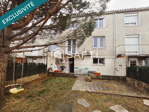 MAISON DE VILLE AVEC GARAGE ET JARDIN