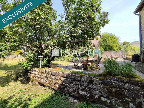 Grande maison individuelle avec garage et jardin
