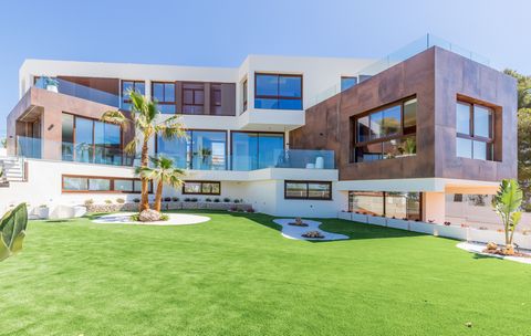 Villa Zen Infinity is a masterpiece of modern architecture, nestled between the sea and the mountains of the beautiful town of La Nucia, just minutes from the vibrant coastal city of Benidorm. From the moment you approach the property, you are drawn ...