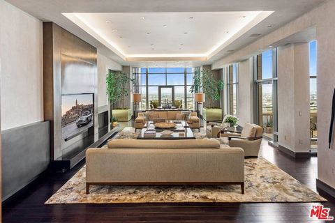 LA's most dynamic high-rise offering, 'Penthouse23 at the Carlyle'. Quintessential 5-star luxury and a lifestyle of security with 24HR valet pkg, full-service amenities, and very-low HOA dues of $4629 monthly. Rarely available, this half-floor, apprx...