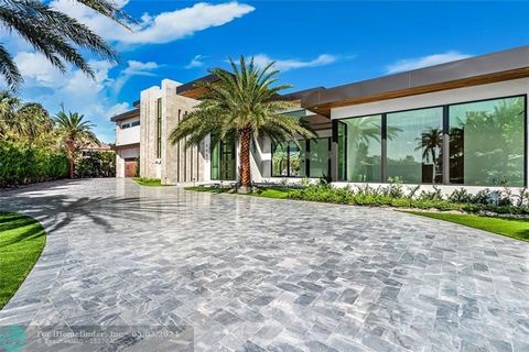 Brand New, Gated Modern-inspired Intracoastal Estate sited on 161± feet of waterfrontage in no-wake zone facing the mega-mansions of Hillsboro Mile. Front Row views from this bespoke architectural masterpiece are encased in glass showcasing all major...