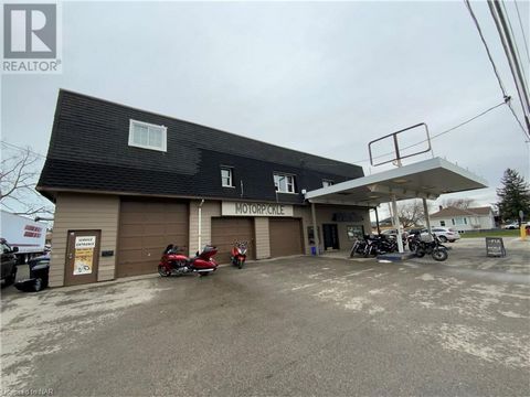 Solid net include from this mixed use residential/commercial building that includes 3 residential (2-2bedroom and 1-1 bedroom) and 2 commercial units (both currently rented by same tenant). Fully rented. Lots of updates in the to the building over th...