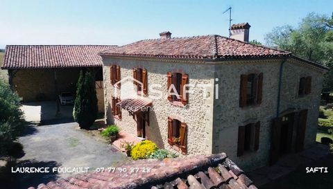 Jolie maison en pierre sur 1,6 ha, proche des commodités.