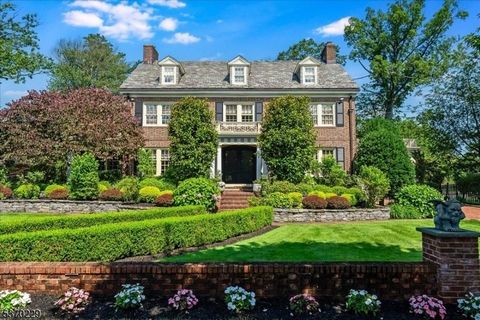 Timeless Elegance Meets Modern Luxury in This Fully Renovated 1925 Gem with over 8,000 sq. ft. of living space was meticulously rebuilt in 2016 down to the studs, blending old-world charm with every modern convenience.A grand, oversized foyer welcome...