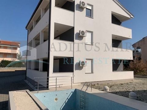 Two bedroom apartment on the ground floor of an apartment building for sale.   The apartment consists of two bedrooms, two bathrooms, two terraces and a kitchen, dining room and living room open space concept. Total area 94m2.   The apartment also ha...