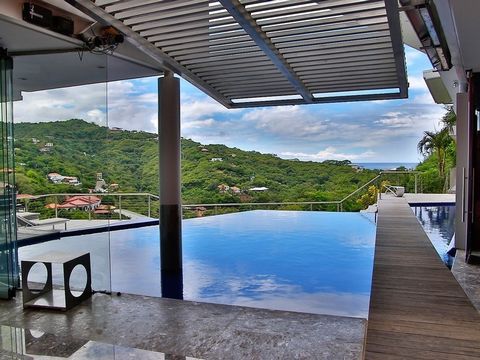 Welcome to Malinche Palace, an incredible 8 bed, 8.5 bath income producing ocean view home perched above the Pacific in Playa Ocotal in Guanacaste, Costa Rica. Experience breathtaking views of the ocean and mountains in almost every direction. Modern...