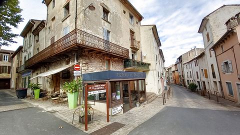 In the heart of the village of St GERVAIS sur Mare, beautiful stone building to renovate, rental income in progress. Ideally located, close to shops, parking 20 m, view of the central square of the village Ideal investor!! Basement: 2 cellars, one of...