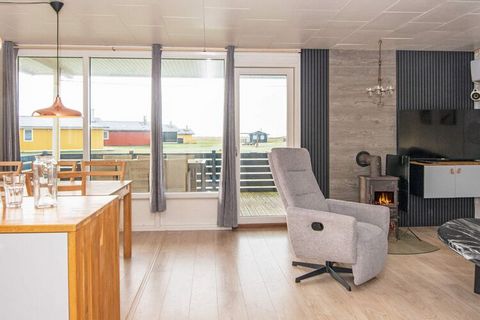 Cottage with sea views located just approx. 50 meters from the roaring North Sea and the child-friendly beach. The cottage is equipped with an energy-saving heat pump and appears bright. Practically furnished with a combined living room / kitchen wit...