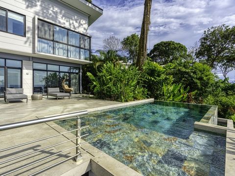 Indulge in luxurious living at its finest by staying in this breathtaking 3-bedroom villa on the front ridge, providing unobstructed ocean views reminiscent of the stunning scenery of Big Sur, California. This magnificent abode is an exquisite combin...