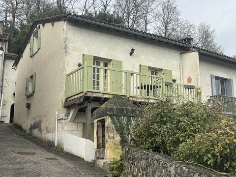 Summary Pretty town house with views at Aubeterre -Sur- Dronne, this is an ideal holiday home, as it is in the centre of the Village, you can walk easily to the shops, bars and restaurants and the river beach is nearby too. The house is set over thre...
