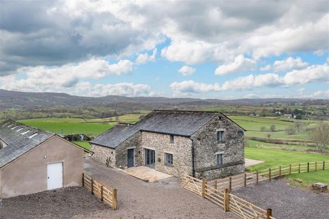 With amazing far reaching views over the panoramic and undulating Lyth Valley to the Lakeland fells beyond this light and well proportioned detached two storey barn conversion stands well enjoying an enviable and commanding position. Welcome To Life ...