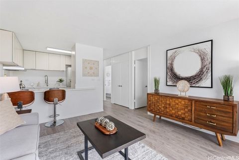 Discover this beautiful renovated 2-bedroom,1-bathroom condo with two parking spaces. Experience sunset views from your spacious lanai on the 4th floor of this turnkey home, which features a recently completed renovation with pristine, never-used liv...