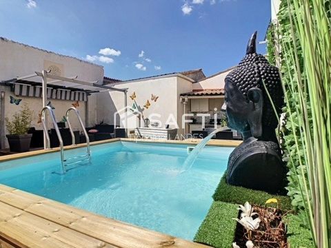 Ensemble immobilier rénové avec piscine.