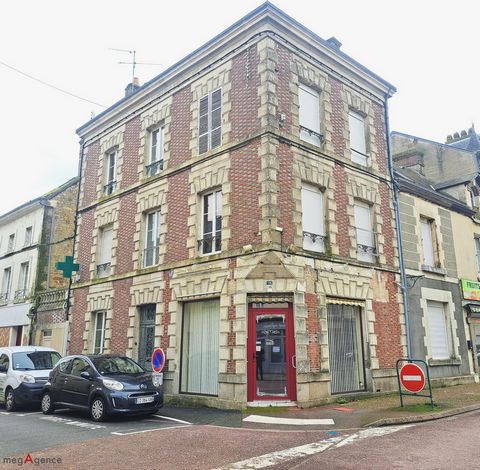 Immeuble 265m² compsé de 4 lots avec jardin