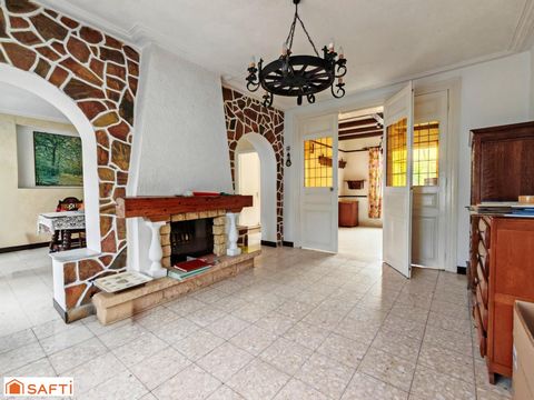 À vendre – Maison à double distribution à Saint-Saulve avec garage et jardin – Proche de toutes commodités