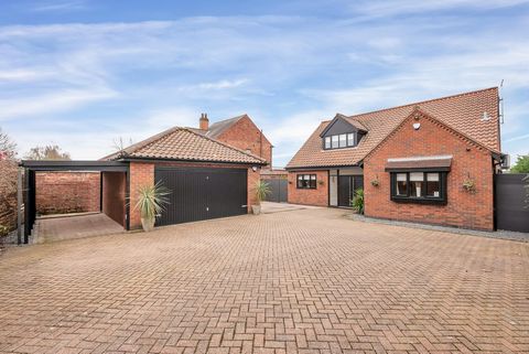 Introducing a spacious and contemporary 4 bedroomed detached home that exudes style at every turn, nestled in a highly desirable, convenient and sought after village location. DESCRIPTION As you enter the property, you are greeted by a spacious recep...