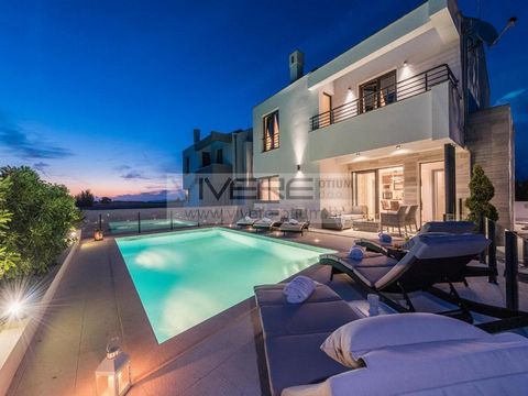 Property description: The architecture of this villa melds perfectly with its beautiful surrounding garden and lush landscaping. The villa, overlooking the sea and the Velebit Mountains, is close to all amenities while still offering peace and privac...
