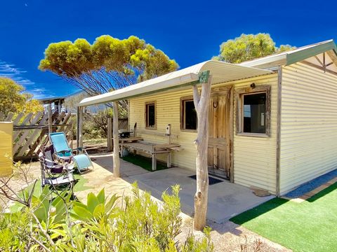 Love the beach, fishing and surfing? Look no further than this well set up little shack in the coastal township of Sceale Bay! This funky little shack is perfect as a base for long lazy days in this pristine part of the world, and is offered on a “wa...