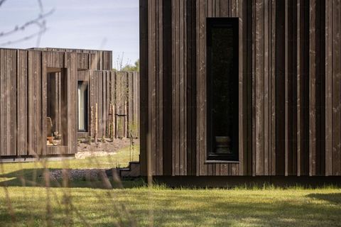 The beautiful design of this luxury holiday home fits perfectly into the natural surroundings of the resort and is located on the edge of the forest. The furnishing and interior have been carried out in the same style by using natural materials and a...
