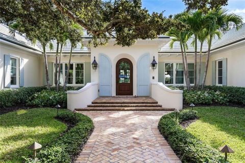 Perfectly situated and nestled in privacy landscaping, exquisite home on cul-de-sac of charming, historic oak canopied Sandfly Ln with 150 of Riomar CC long golf course views. 2015 custom built w/ terrific architectural detail and superlative finishe...