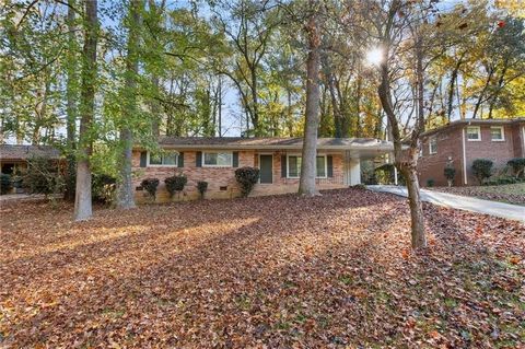 Lovely 4-sided brick ranch located in the Gresham Park area of Atlanta. Situated on a nearly half acre lot. Covered front porch and attached carport. Fresh paint inside with hardwoods throughout. The kitchen opens into a large dining room with crown ...