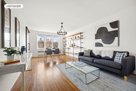 SUNNY & SPACIOUS - AND AT THE TOP: Perched on the top floor of an elevator building, this bright two-bedroom coop in Ditmas Park boasts an expansive layout with room to grow into. Enter this sunny home via a large entry foyer that features a deep clo...