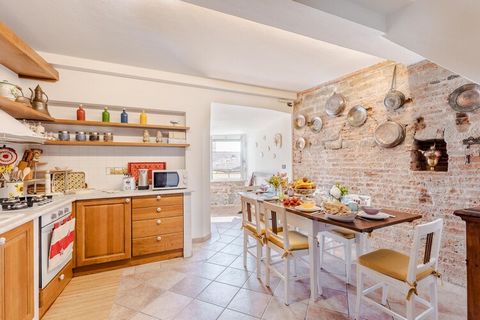 Step into a living piece of Italian history within this unique apartment set inside the medieval tower of the Bastion of Porta San Gervasio, one of Lucca’s original fortifications dating back to the 1100s. These storied walls once housed the town’s g...