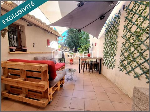 MAISON DE VILLAGE AVEC GARAGE ET EXTERIEUR