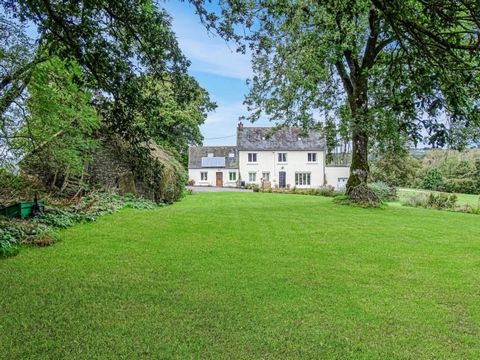 A wonderful opportunity to buy a detached 4 bed property, with a 1 bed gîte which has just over 10 acres of land.  It has a number of outbuildings, a stable and a riding arena. Situated in a peaceful but not isolated location on the edge of the typic...