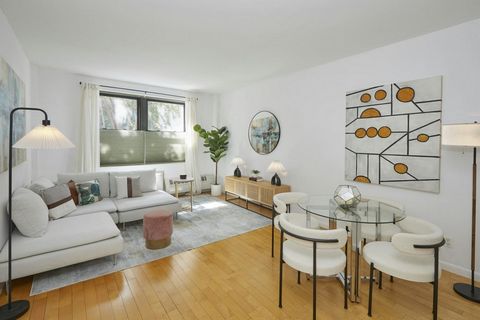 Welcome home to this charming 2-bedroom, 1.5 bath condo duplex at 251 16th Street, Unit 1A, nestled in the heart of Brooklyn's vibrant Park Slope neighborhood. Boasting an expansive 1,080 square feet of living space, this first-floor duplex gem combi...