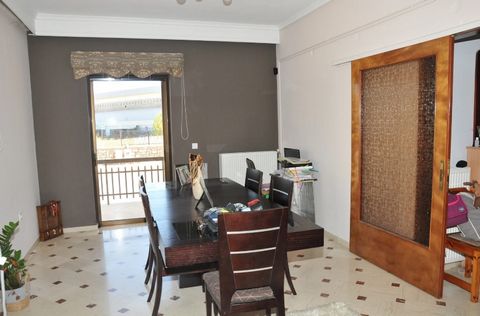 Detached corner house for sale in Megalopoli Arkadias. The house is 130 sq. m. on a  plot of 305 sq.m., consists of 3 bedrooms with wooden floors, 1 bathroom, wc, kitchen, living room with the dining room and it also has 1 parking (open), garden, sto...