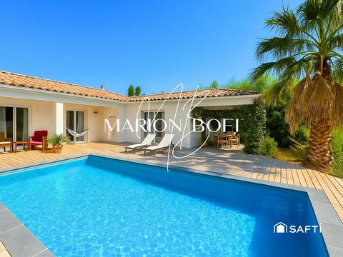Maison de 113 m2 trois chambres , avec piscine et garage sur un terrain de 700 m2