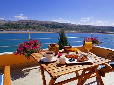 Luxury villa, Pag Island Area: 600 m2 Detached villa on an attractive plot of 726 m2, first row to the sea. It is located near the main city beach Prosika and the smaller beach Mađarica, close to beach bars, shops, tennis courts, and the city center,...