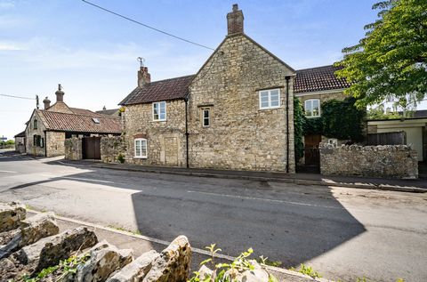 Located in the picturesque village of Marksbury, just a 15-minute drive from Bath, this Grade II listed extended gem, dating back to the 17th century, beautifully blends history with modernity. The property also includes The Forge, a one-bedroom anne...